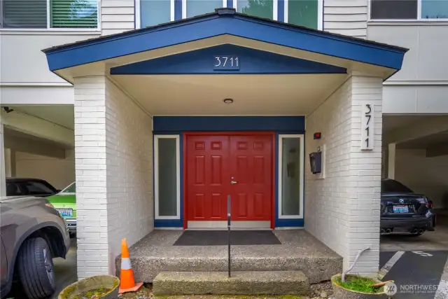 Front of building entrance- Don’t miss this opportunity to own a home in one of Magnolia’s most desirable communities!
