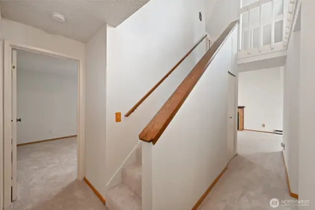 Stairs to the open loft office and bedroom space
