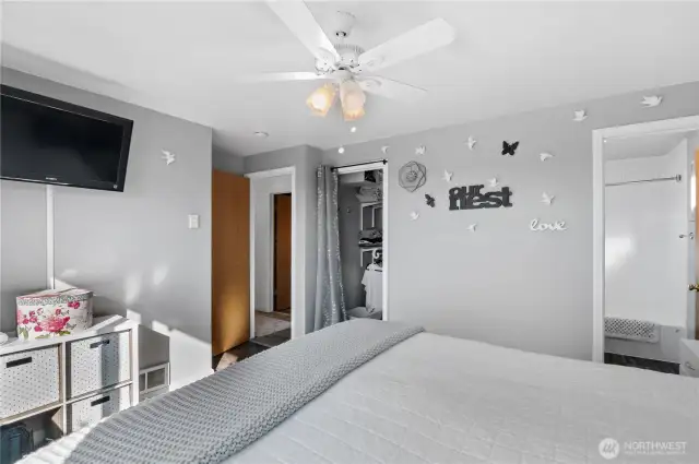 Primary bedroom has an attached walk in closet and full bath