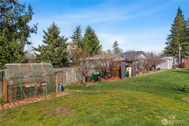 This home faced east / west. Perfect to put your seedling's in the greenhouse for planting later