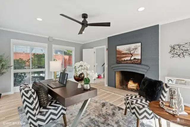 Great room with custom mosaic fireplace.