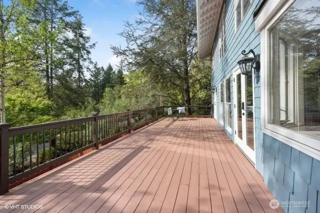 Oversized deck great for relaxing and entertaining.