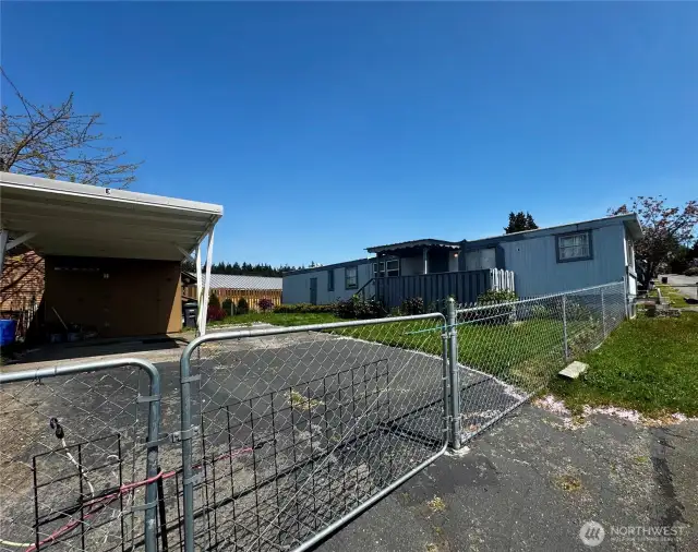 Fenced with a carport