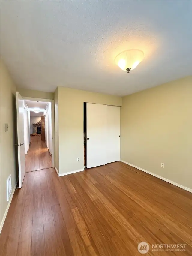 Second bedroom with built-in shelving