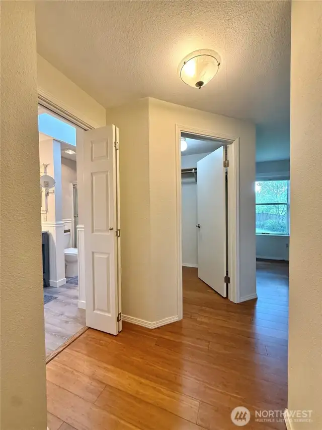 Enter the primary bedroom here, primary bath to your left and walk-in closet straight ahead