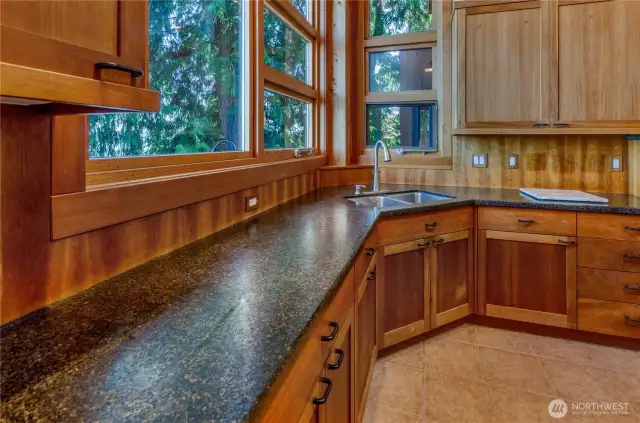 Working gourmet kitchen with high end appliances and the perfect "triangle" of sink, stove and fridge.