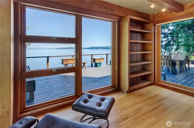 Main floor reading area in library with an abundance of natural light.