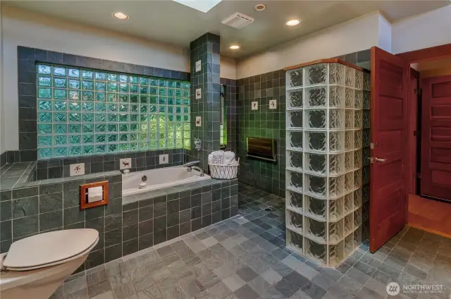 Primary bath as large 0 clearance access to the shower, an oversized soaking tub, vanity and lots of natural light!