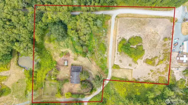 Nearly 4 acres with endless possibilities. Large-scale gardening, landscaping projects, or even creating a hobby farm.