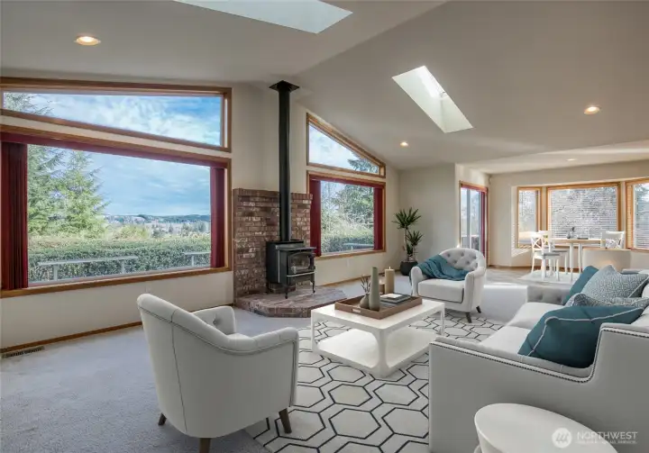Living room with gas stove, virtually staged
