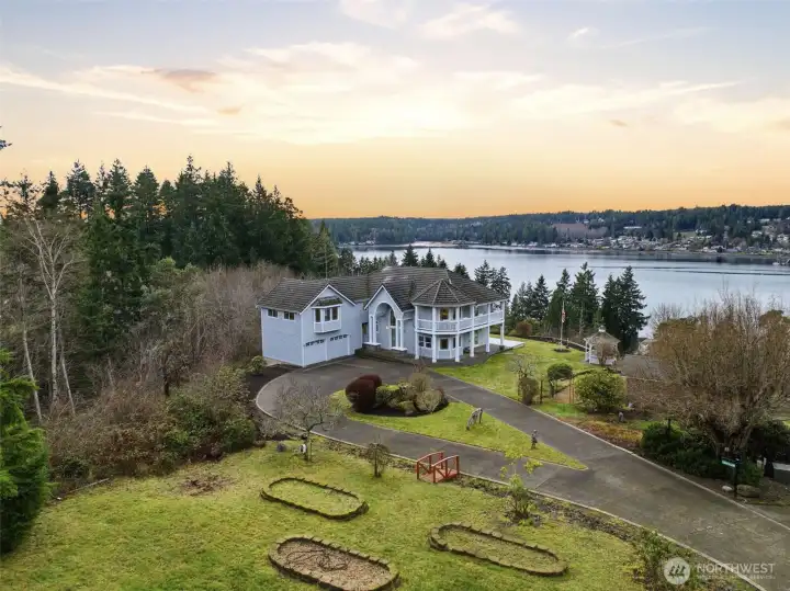 Looking towards the back of the home from 1.02 acre upper lot