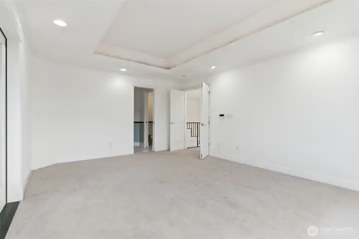 Primary bedroom looking towards primary bathroom