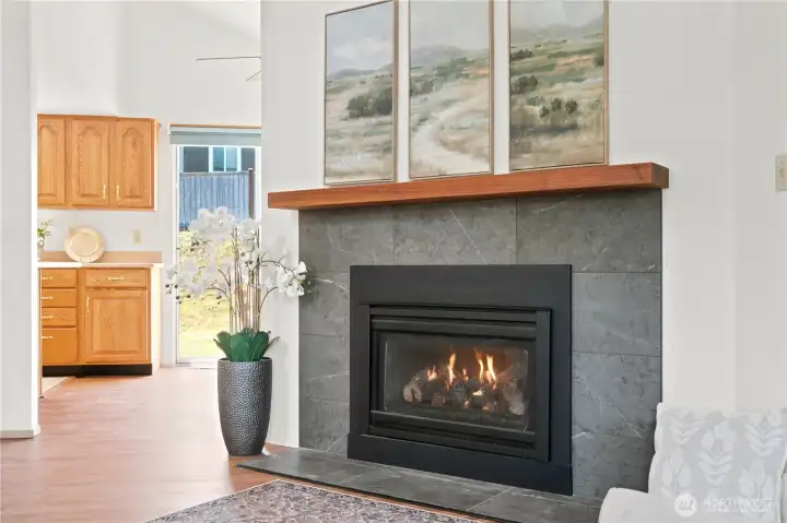 Recently remodeled modern gas fireplace for chilly days.