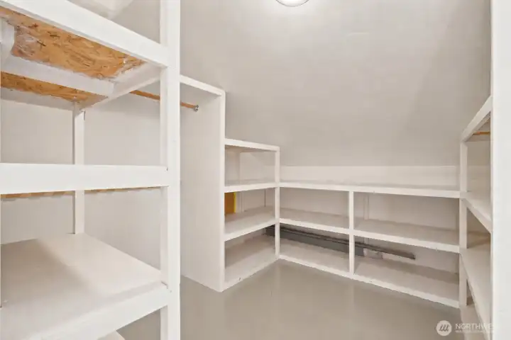 Bonus!  Upstairs Indoor storage room complete with built-ins.