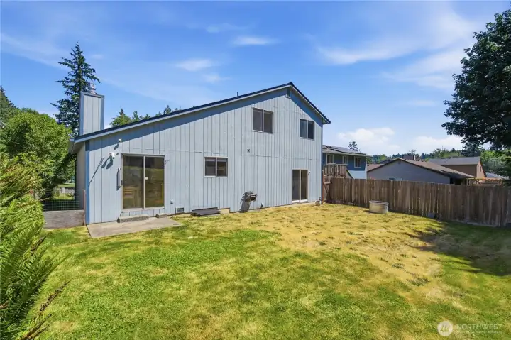 Large and Fully fenced, sunny backyard. Perfect for pets, playtime and gardening projects