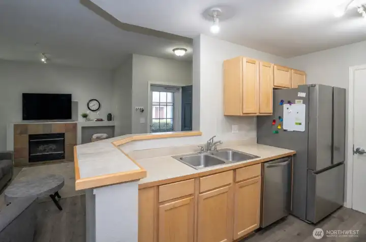 Open kitchen flows into the living area, keeping you connected while entertaining or relaxing.