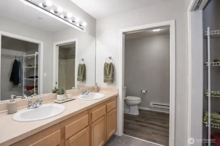 Primary ensuite includes a separate water closet for added privacy and comfort.