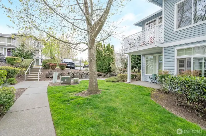 A walking path is conveniently located just off the covered patio, perfect for a quick and easy stroll.