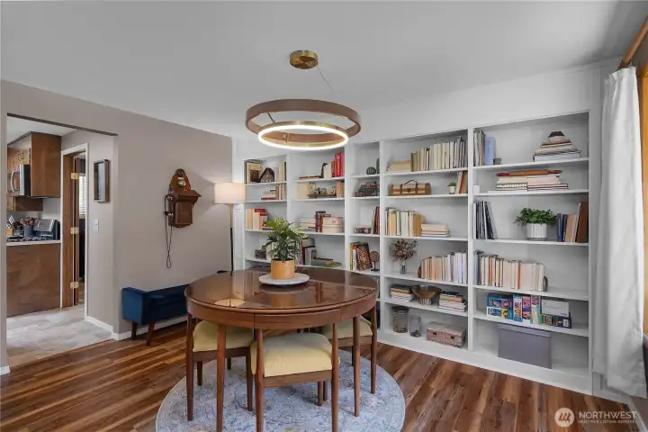 Alternate view of dining space looking left into kitchen. Laundry space is directly off kitchen towards garage.