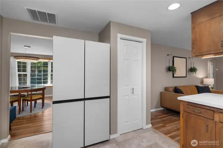 View from kitchen looking back towards dining/living space. Notice all new top of the line appliances!