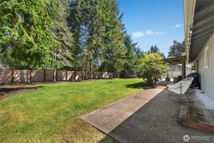 Additional uncovered patio space directly to left of covered pergola.