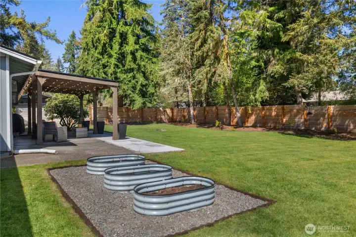 Gardening made easy with built in planters. Notice the brand new fence all around.
