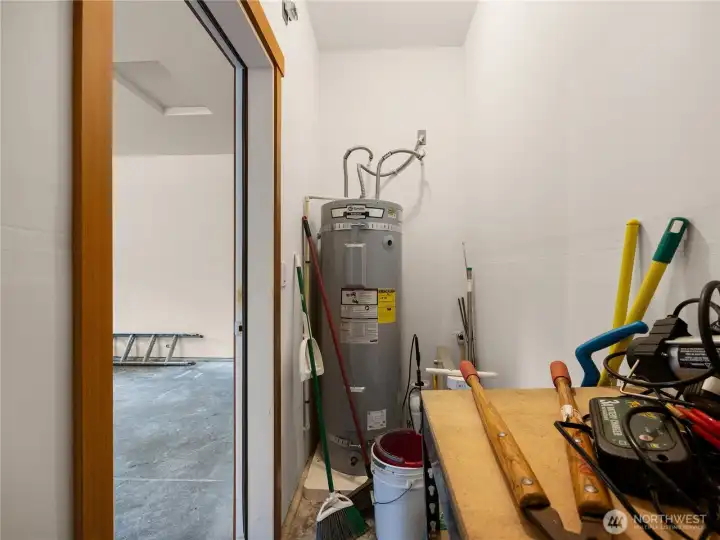 Dedicated utility and storage area located within the garage space for added functionality.