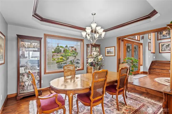 Off entry is formal dining with trey ceiling