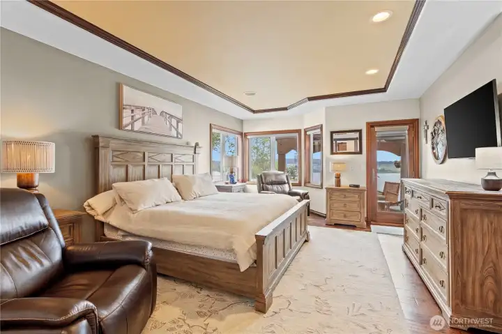 Spacious and convenient primary on main with door to deck