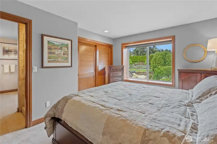 3 of 3 bedrooms upper level with attached bath that doubles as guest bath off hallway