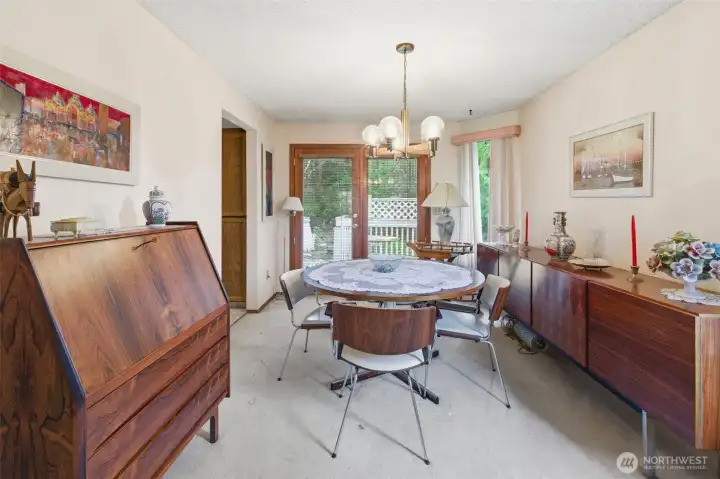 Dining room with French doors off to the deck (please stay off the deck) Dining room with French doors off to the deck (please stay off the deck)