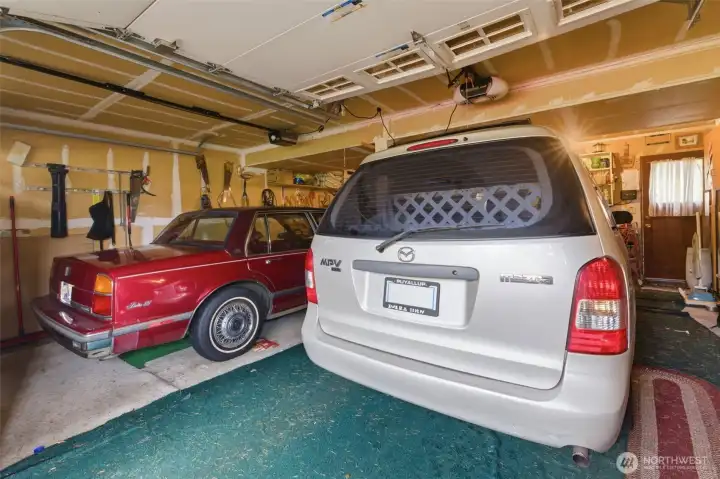 Two car garage (with two cars that convey) Two car garage (with two cars that convey)