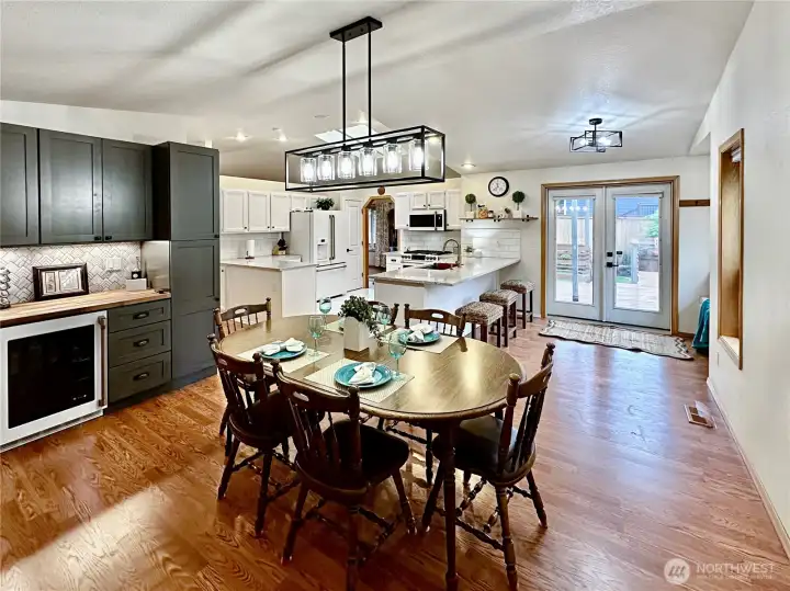 This shows the access to the kitchen, back deck and coffee bar area from the family room. This shows the access to the kitchen, back deck and coffee bar area from the family room.