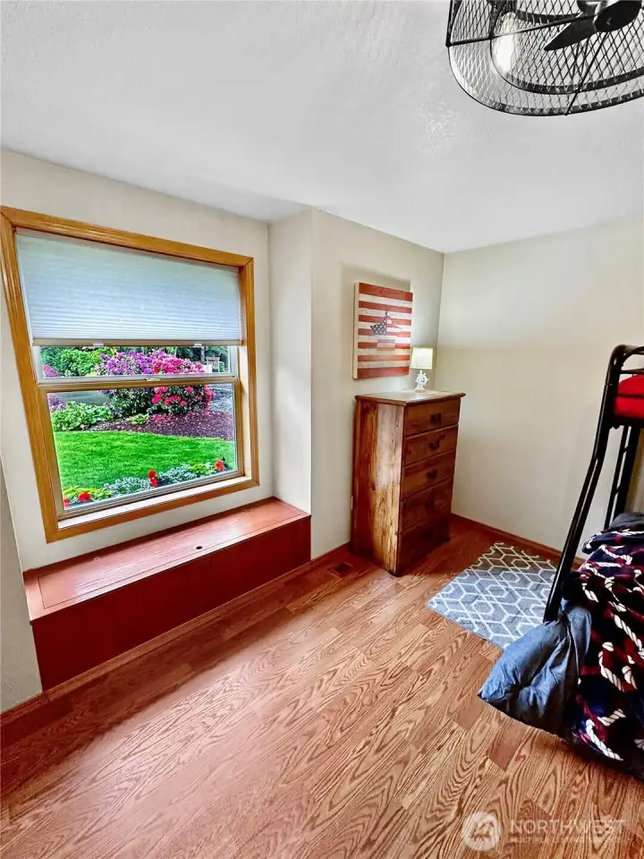 Window seat with storage area that's great for bedding or toys. Window seat with storage area that's great for bedding or toys.