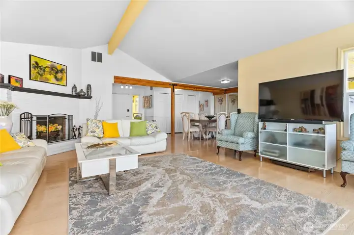 Living room towards dining area and entrance Living room towards dining area and entrance