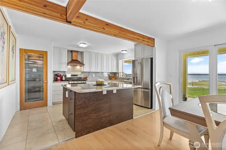 Kitchen with granite countertops, island, and pantry Kitchen with granite countertops, island, and pantry