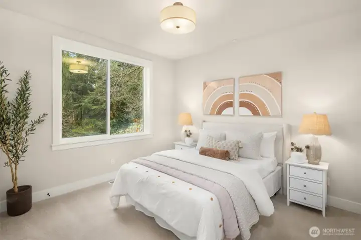 Staged photos of similar home on Lot 6.