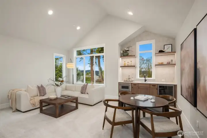 Staged photos of similar home on Lot 6.