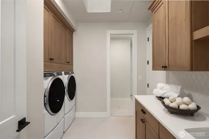 Staged photos of similar home on Lot 6.