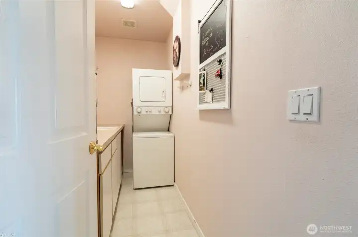 Upstairs laundry area with sink and counter top.  Also there's a downstairs laundry as well!