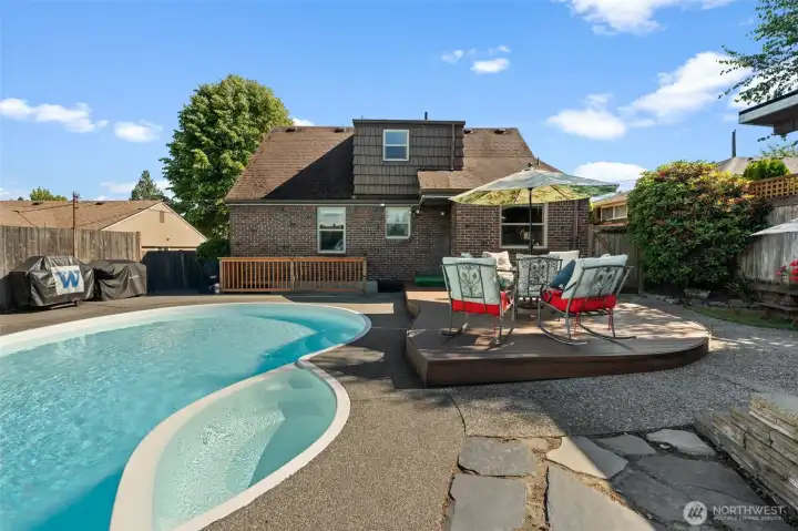 Sparkling blue water and a spacious surrounding patio make this pool a total showstopper. Designed for both high-energy hosting and peaceful relaxation, it’s the ultimate staycation right in your own backyard. Sparkling blue water and a spacious surrounding patio make this pool a total showstopper. Designed for both high-energy hosting and peaceful relaxation, it’s the ultimate staycation right in your own backyard.