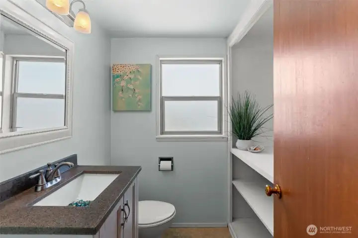 Designed to effortlessly serve both guests and residents, this powder room combines clean lines with elegant fixtures for a fresh, clutter-free look. Designed to effortlessly serve both guests and residents, this powder room combines clean lines with elegant fixtures for a fresh, clutter-free look.