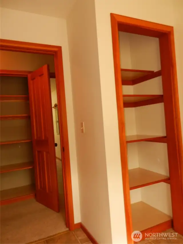 Extra storage in the hallway closet and closet in office area.