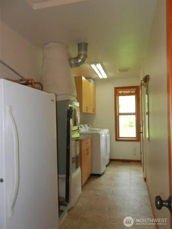 Laundry room/mudroom. Brand new washer and dryer included.