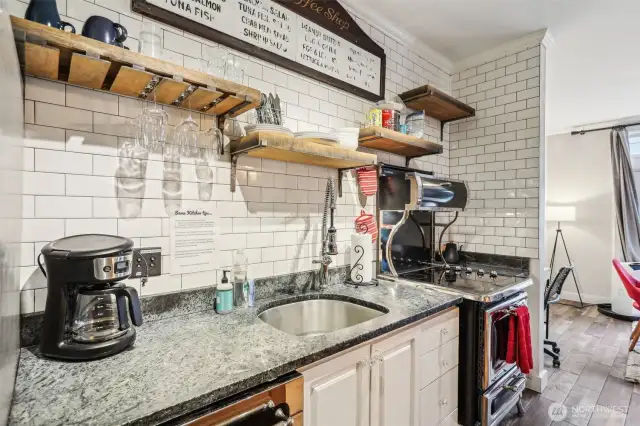 Kitchen with subway tile and Heartland appliances