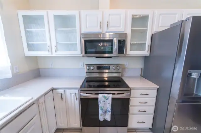 quartz tops, all new appliances n your beautiful kitchen