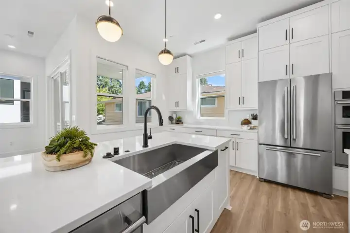 Chefs dream kitchen (staging and furniture are for decoration and not included in the sale of this home)