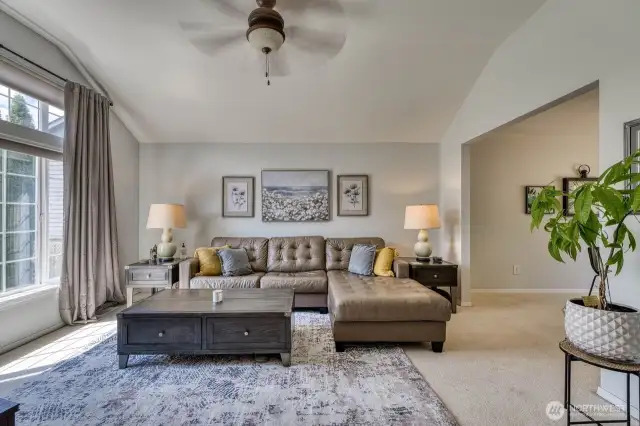The formal living room features lots of natural light from the large southern facing windows.