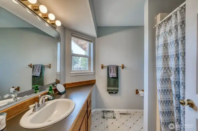 The primary suite 3/4 bath, very spacious and practical.