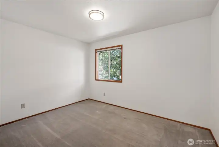 2nd Bedroom with a view of the beautiful Red Maple Tree.
